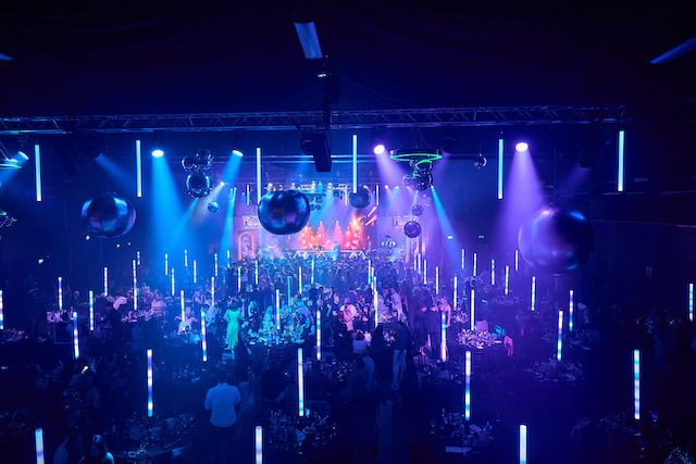 stunning event space, lit in blue to highlight why the venue is important for an event