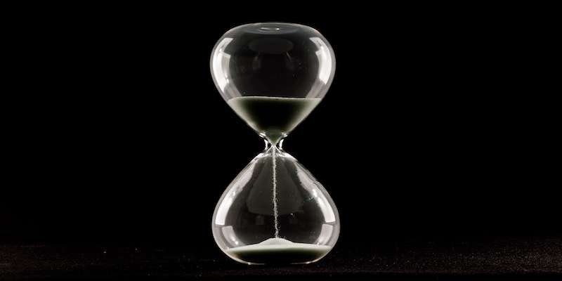 hourglass with dark background