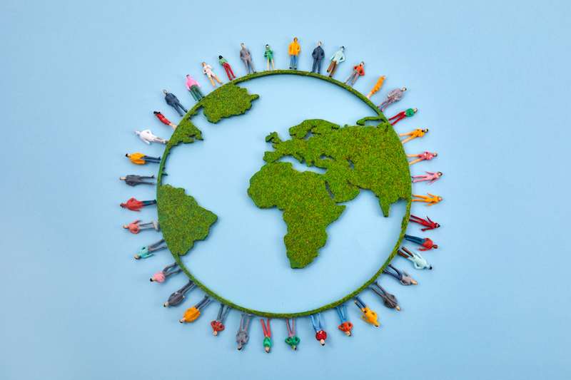 globe circled by people to represent a sustainable event