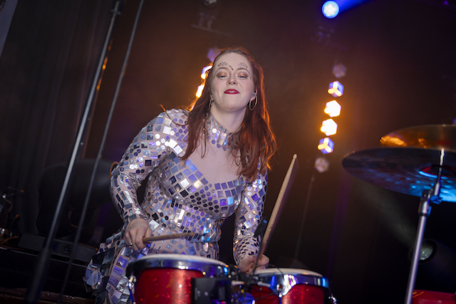female drummer showing the theme of event trends 2026